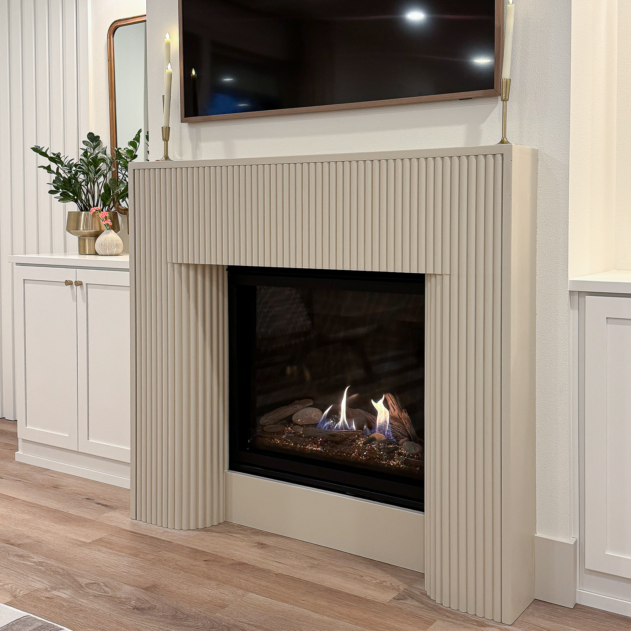 Florenza cast limestone surround installed in a beautiful home.