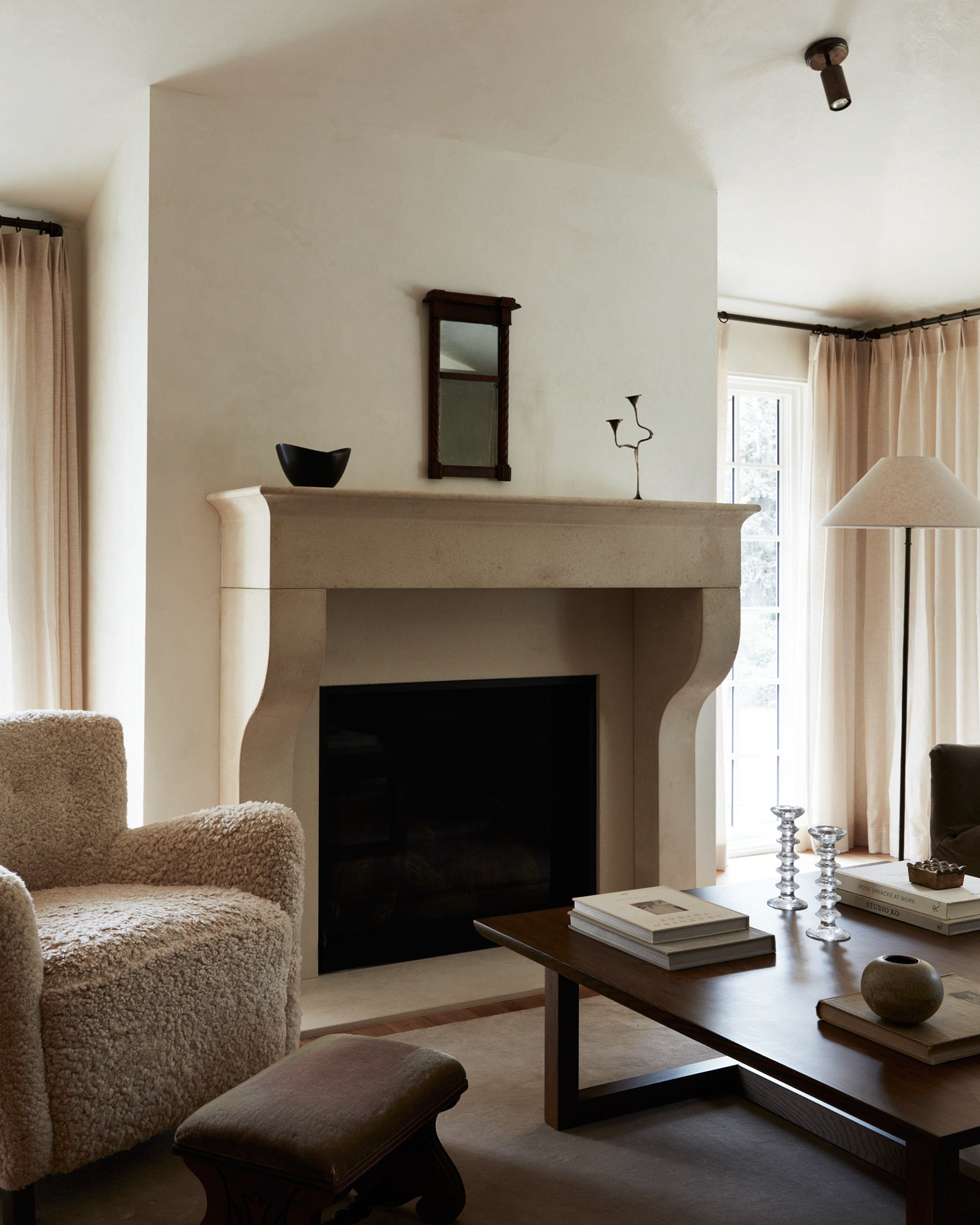 Merano cast limestone fireplace — product render showing the full surround profile