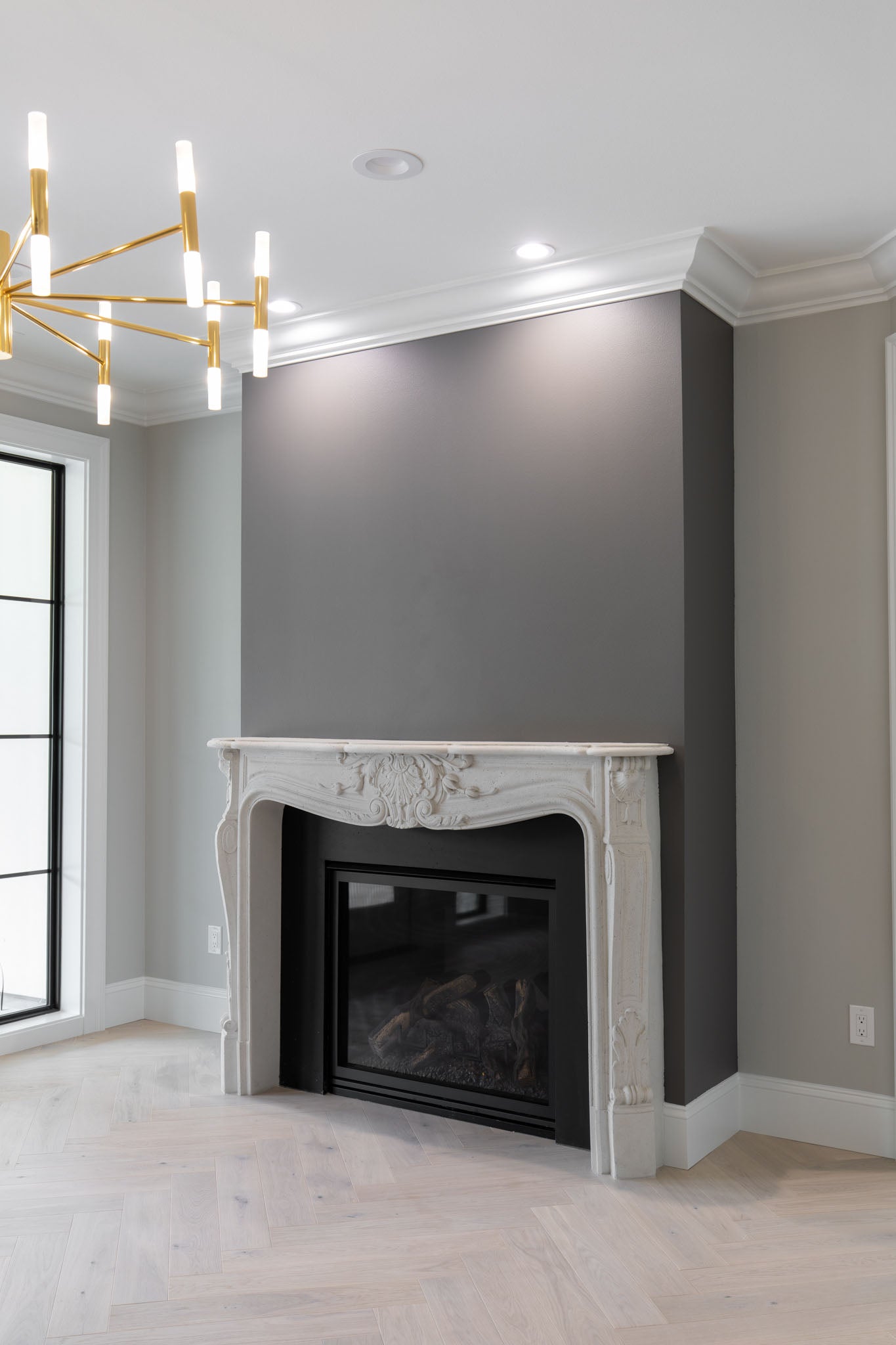 Louis XV cast limestone surround in the River Road Villa — full installation view