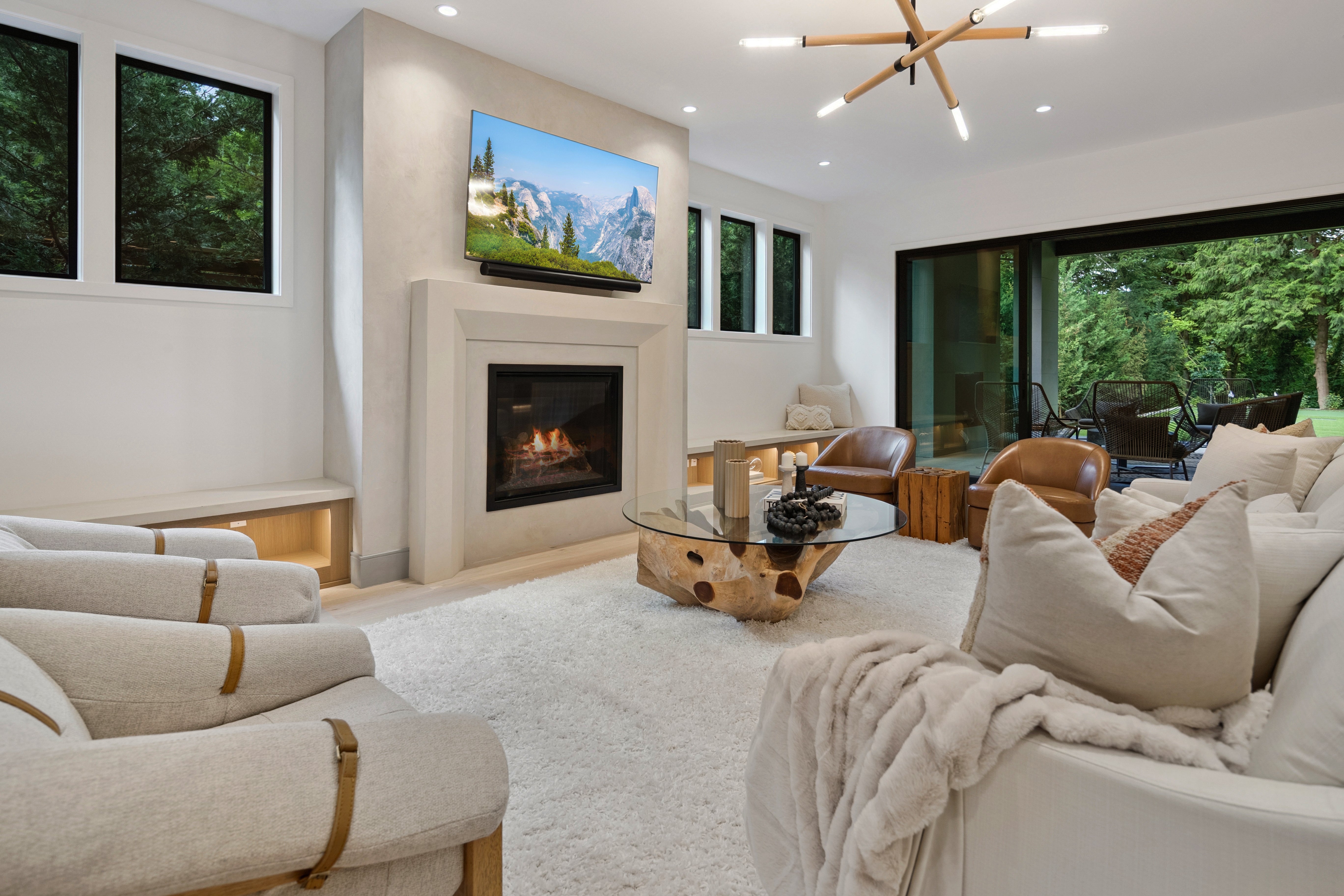 Stunning cast stone fireplace surround installed in an upscale living room