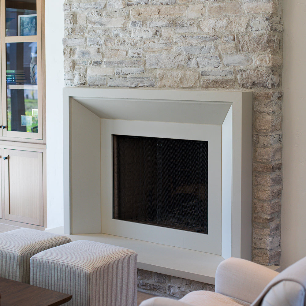 Milan cast limestone surround installed in a modern living space
