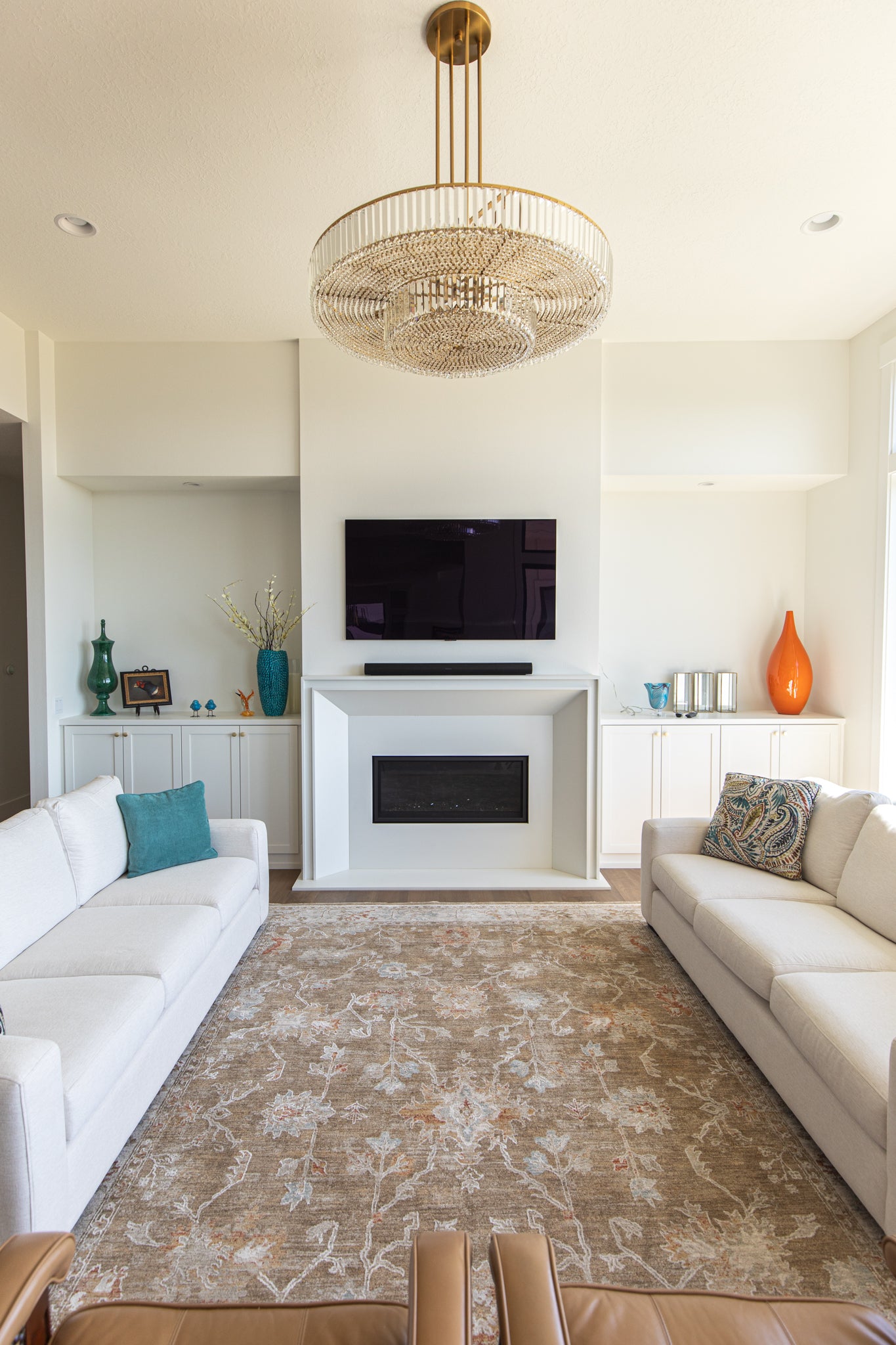 Lucca cast limestone fireplace surround installed in a finished living space