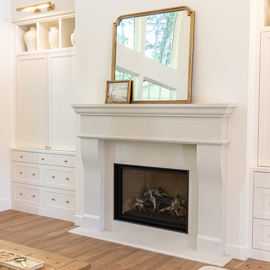 New French cast stone fireplace installed in the Kevin Stone residence