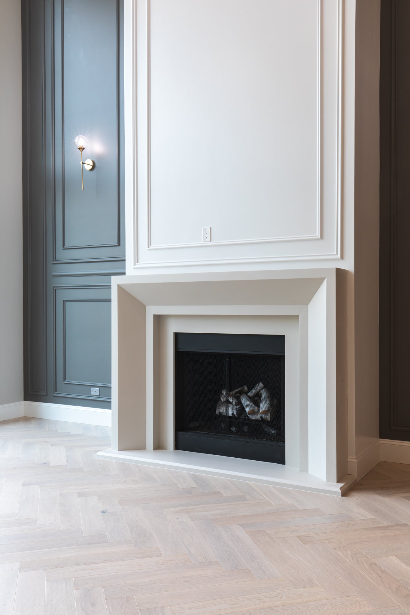 Newport cast limestone surround in a Great Room